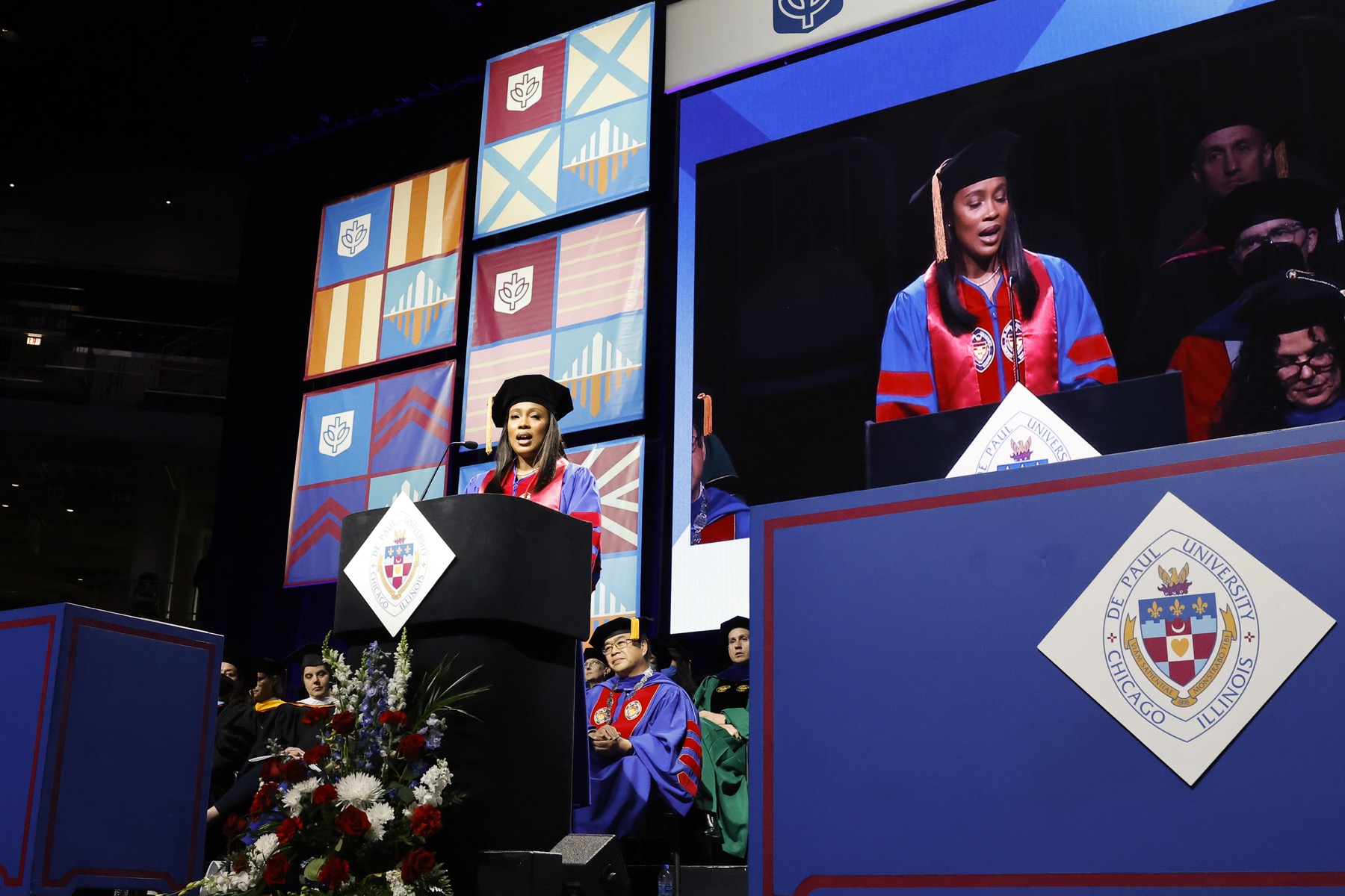 Tara-Ann Dugan delivers the student address at the DePaul University commencement ceremony for the Kellstadt Graduate School of Business.